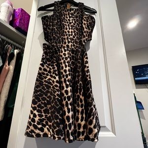 Medium animal print dress with side opening. (Used once)